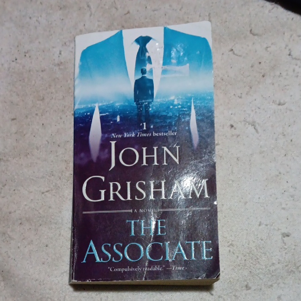 John Grisham's The Associate. A Paperback Novel.